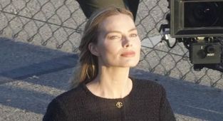 Margot Robbie shows off her toned figure on set of glamorous shoot