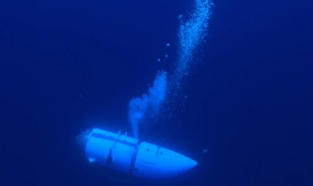 Moment infamous Titan sub is plunged into darkness at bottom of ocean