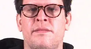 Shocking moment beloved rock band's drummer is hauled away by ICE
