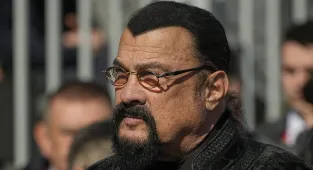 Steven Seagal shows off 400lb figure at Russia's Victory Day march