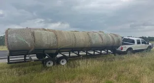 They look like ordinary bales of hay, but cops make surprising find