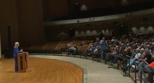 Town hall crowd descends into chaos over pro-Trump congresswoman