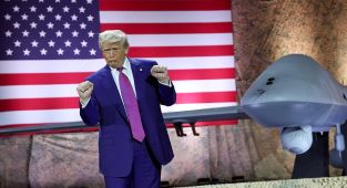 Trump pays tribute to troops at largest U.S. base in Middle East