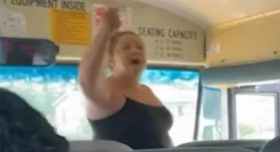 White 'School Bus Karen' who berates black student gets instant karma