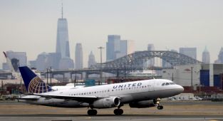 Why are the number of flights reduced at Newark airport in the US?