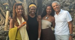 Barack and Michelle Obama put on brave face with daughters