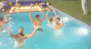 Bizarre moment Lebanese pool party cheers as missiles fly overhead