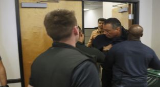 California senator handcuffed during Trump administration news conference