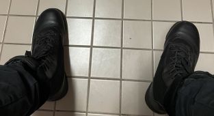 Cat-obsessed gunman posted snap of his FEET moments before killing ten