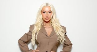 Christina Aguilera looks thinner than ever in suit and kinky boots