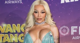 Doja Cat slams 'crazy' fan as she claims he 'manhandled' her in clip