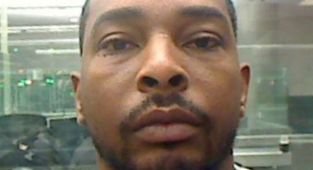 Fugitive accused of killing New York family captured in tourist spot