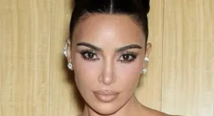 Half-naked Kim Kardashian gives fans a look inside her walk-in closet