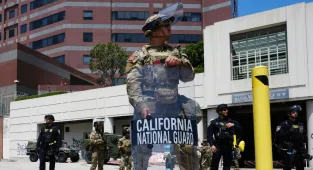 LA police enforce curfew amid protests over Trump’s immigration crackdown