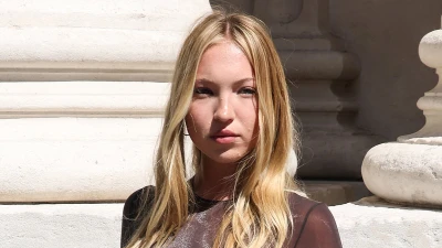 Lila Moss channels mother Kate as she goes braless beneath a sheer top
