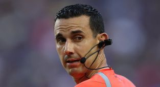 Moment referee pulls out something very different than red card
