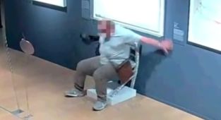 Moment tourist sits on crystal 'Van Gogh' chair and it shatters