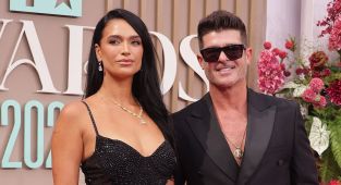 Robin Thicke and April Love Geary flash wedding bands for FIRST time