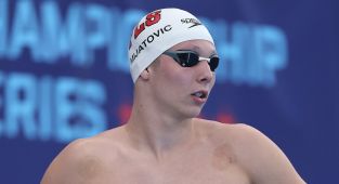 Teen swimming star shatters Michael Phelps' record