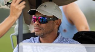 Tiger Woods returns to the golf course months after Achilles tear