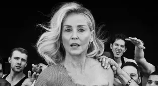 Topless Sharon Stone, 67, writhes around with Halle Berry's model ex