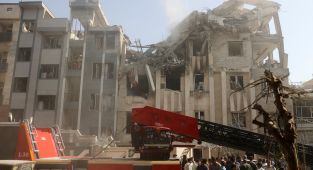 Trump denies US role in Iran attack, warns against strike on Israel