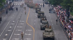 Trump hosts military parade as nationwide ‘No Kings’ protests denounce him