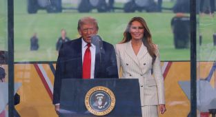 Trump, Melania arrive at military parade as crowd sings happy birthday