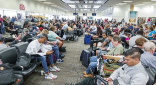 US airline shutters, warns people with tickets not to come to airport