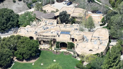 A-lister mansion that takes up a ZIPCODE... with mysterious symbols