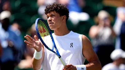 American star takes just 70 SECONDS to win Wimbledon match