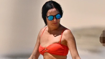 Bikini-clad Andrea Corr shows off her age-defying figure in Barbados