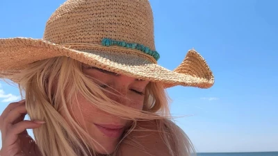Bikini-clad Livvy Dunne hits the beach as she celebrates July 4th