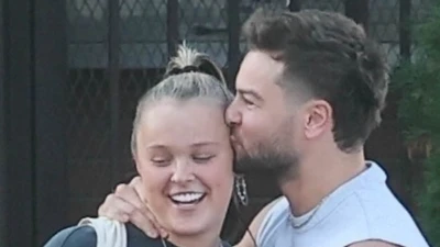 Chris Hughes packs on the PDA with girlfriend JoJo Siwa