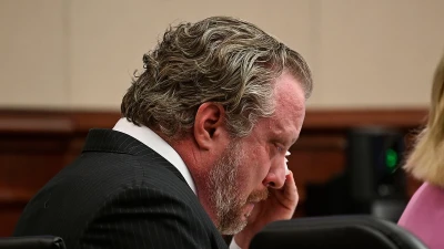 Dentist wipes his crocodile tears while on trial for poisoning wife