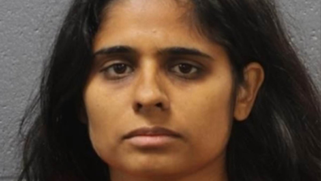 Doctor arrested after 'she let daughter play in backyard pool at 3am'