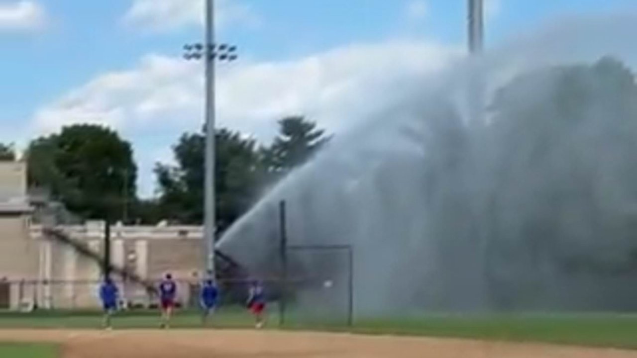 Fire captain drowns baseball team's field after ball hit his truck