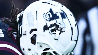 Former college football star gunned down in parking garage dispute