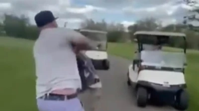 Former hockey player punches rival golfer and throws him into a lake