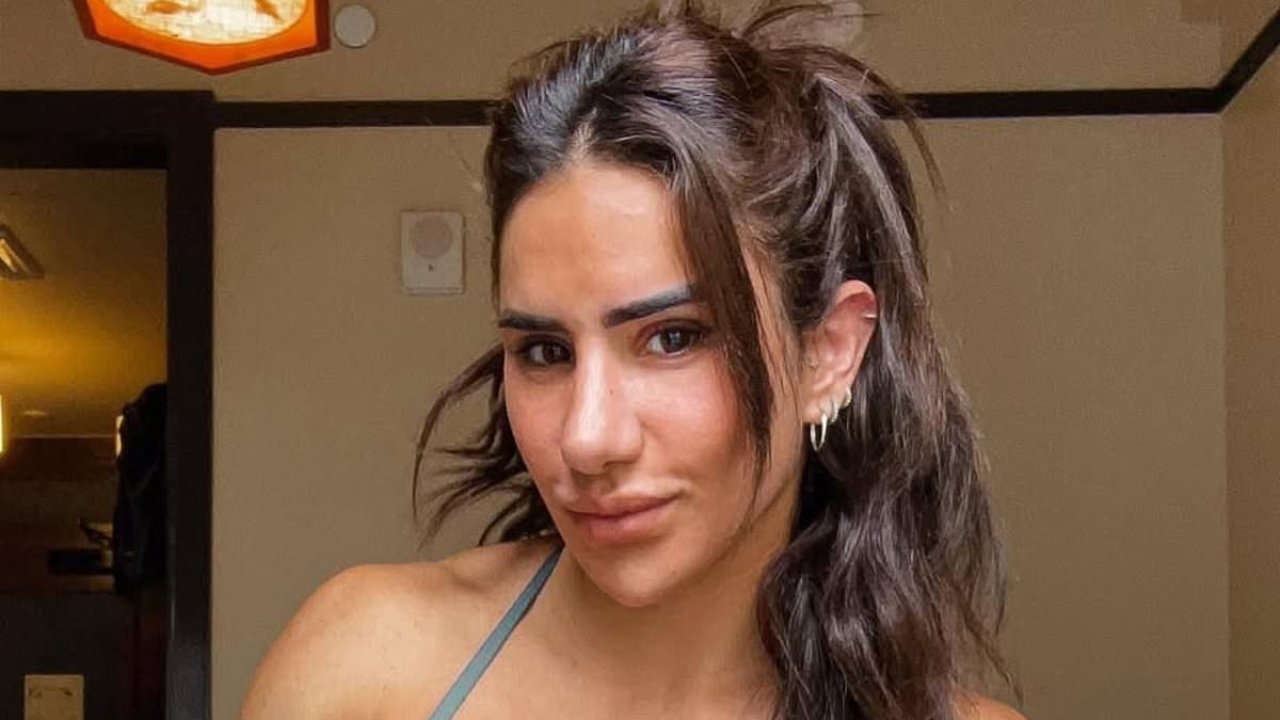 Glamorous boxer and influencer arrested on domestic violence charge
