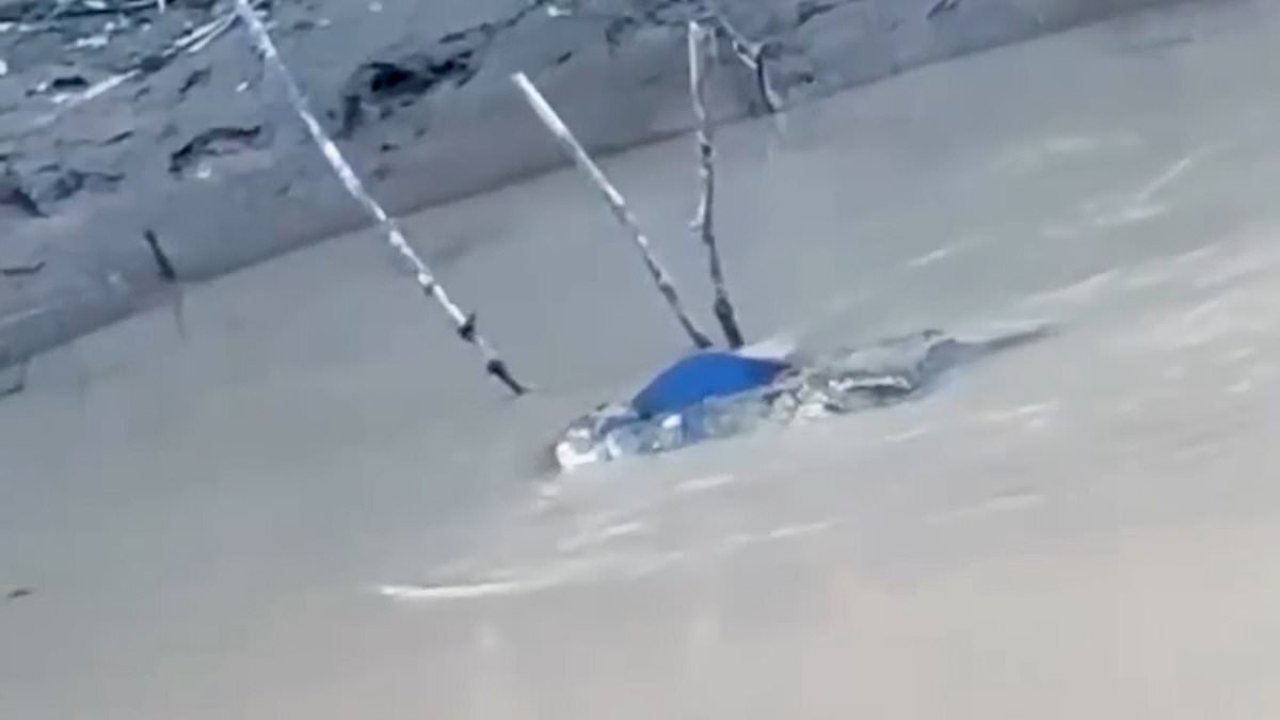 Horrifying moment crocodile carries schoolboy's body away in its jaws