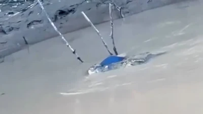 Horrifying moment crocodile carries schoolboy's body away in its jaws