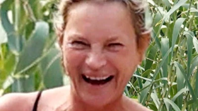 Kate Moss, 51, guffaws during Ibiza beach trip with daughter Lila, 22