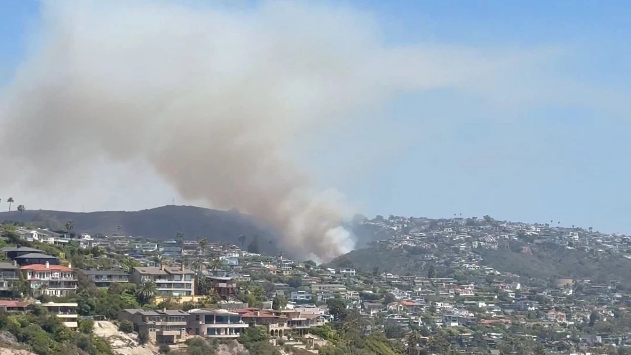 Laguna Beach residents evacuated as massive brush fire threatens homes