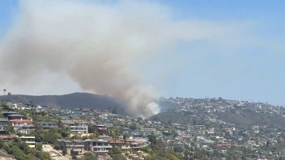 Laguna Beach residents evacuated as massive brush fire threatens homes