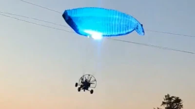 Paraglider flies into live power lines triggering a huge explosion