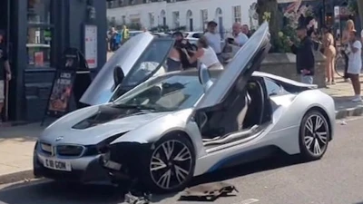 Reckless driver sparks street brawl after crashing £106,000 BMW