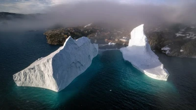 Skyscraper-sized icebergs drifting towards homes on Greenland's shores