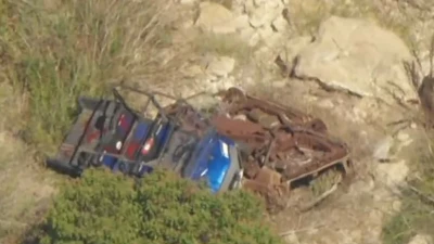 Sophia Hutchins accident site shows wrecked ATV in ravine