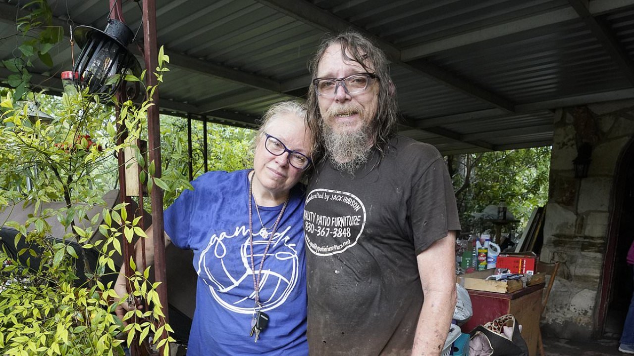 Texas couple trapped by floodwaters survive by clinging onto porch